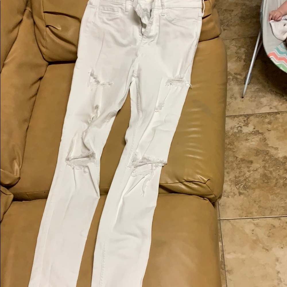 Super Skinny white ripped jeans